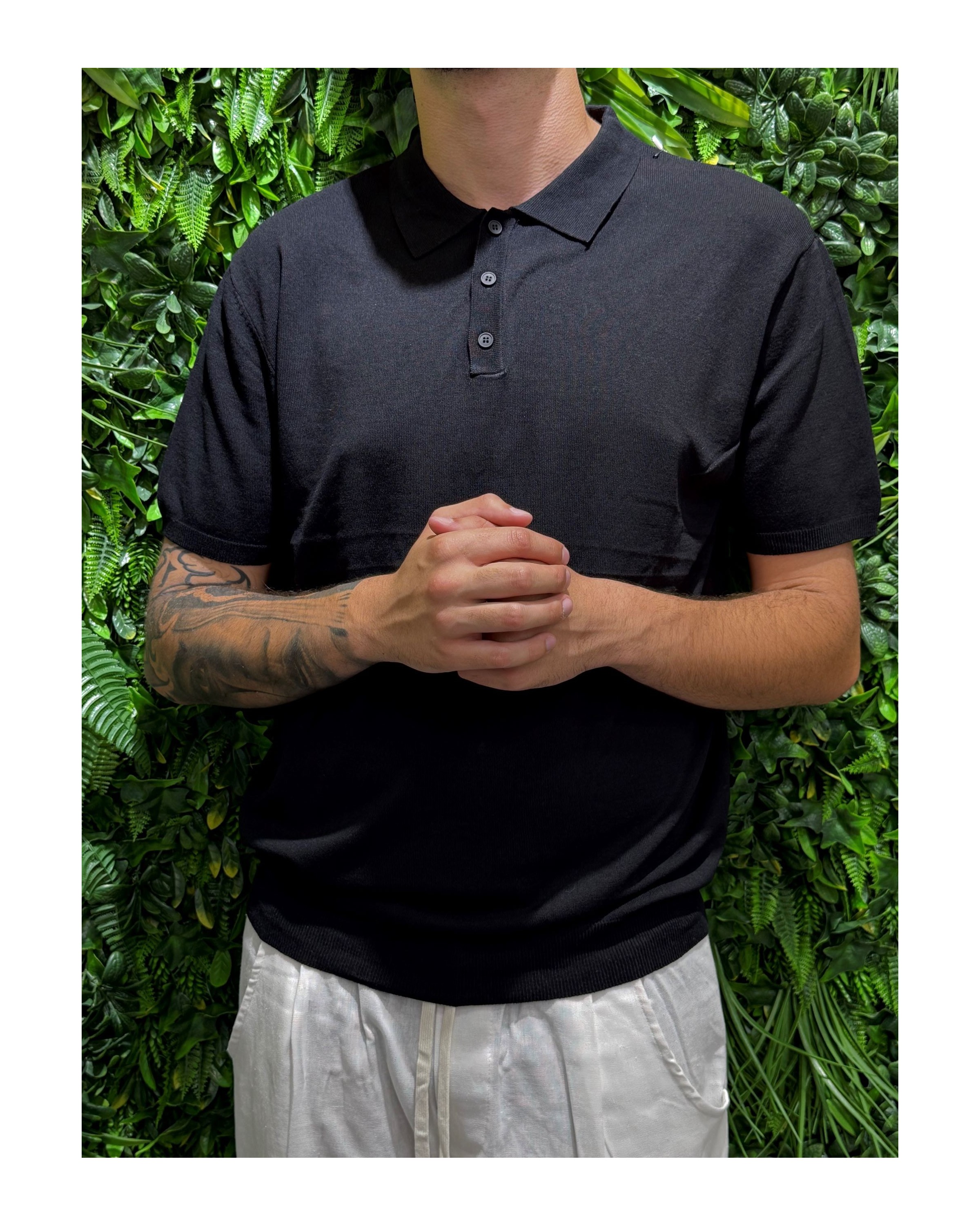 Polo slim fit nera bottoni