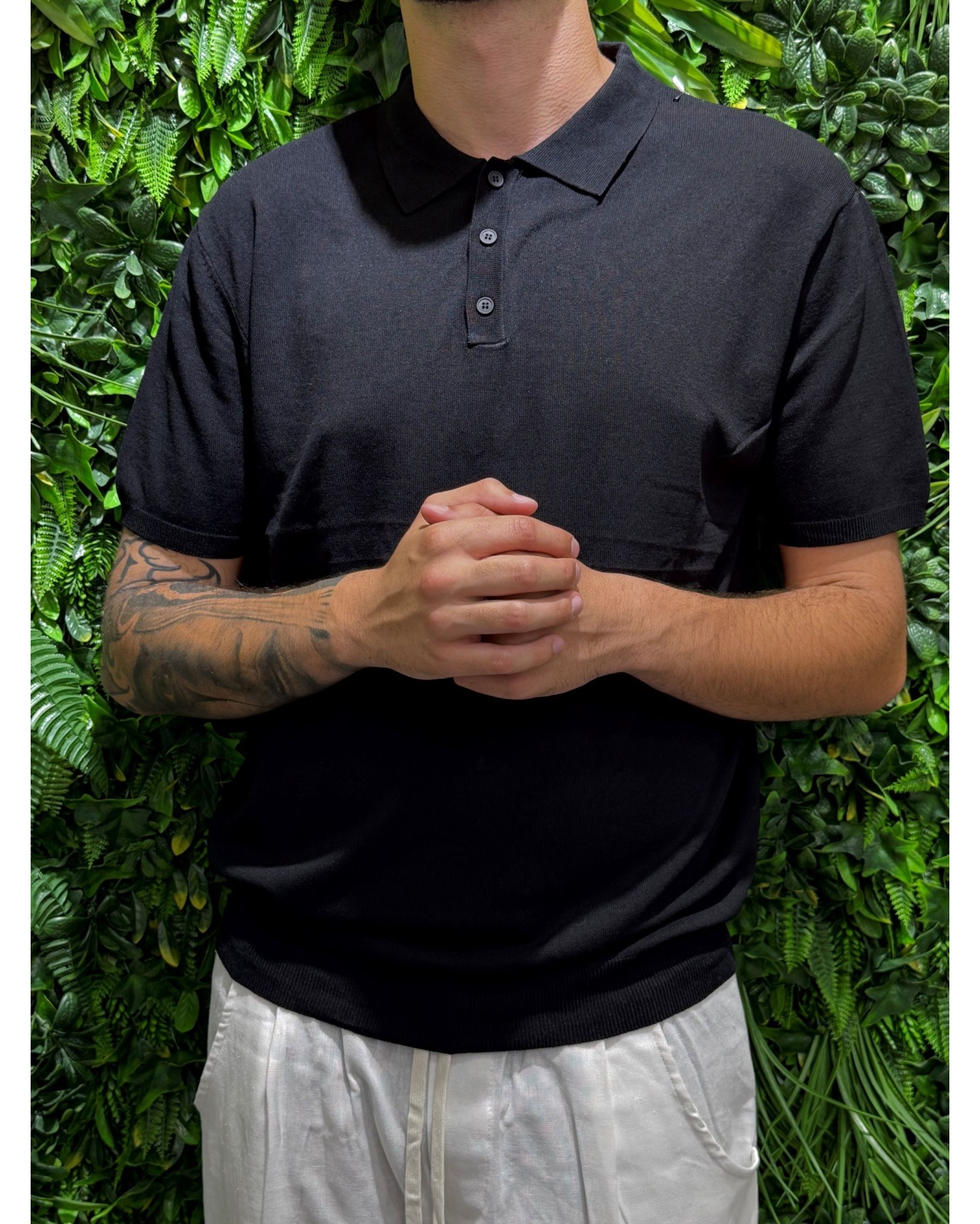Polo slim fit nera bottoni