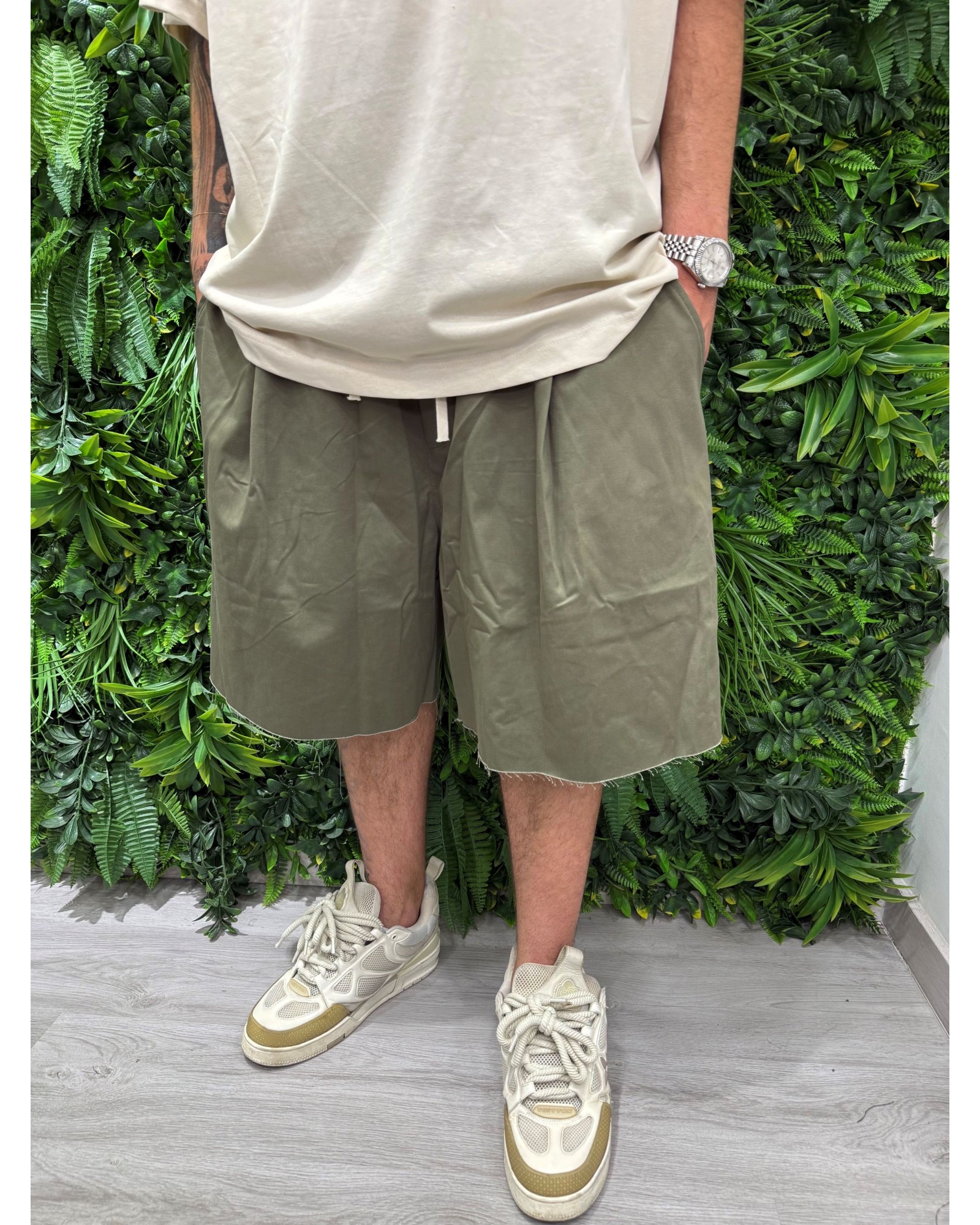 Pantaloncino taglio vivo over verde