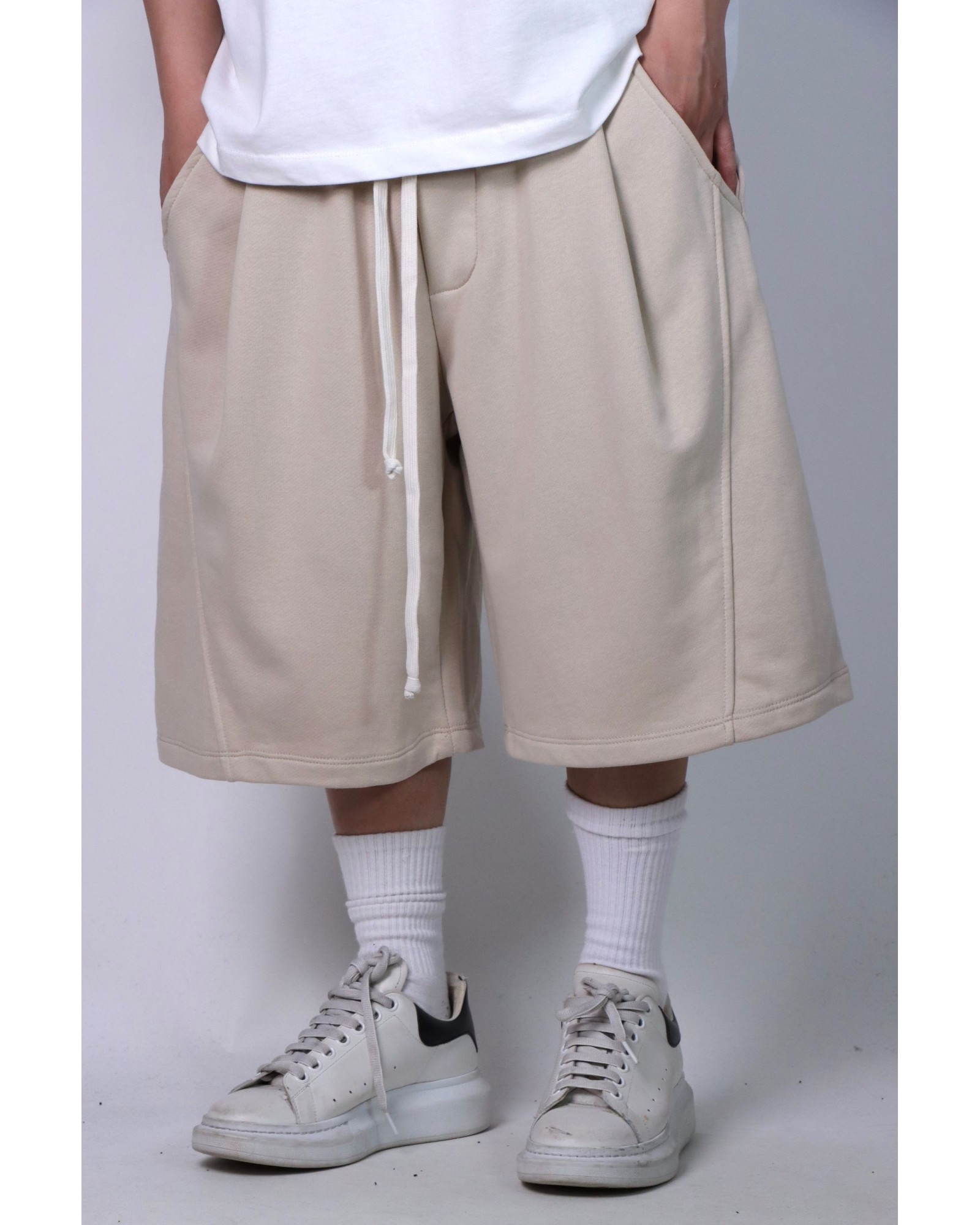 Pantaloncino tuta over beige