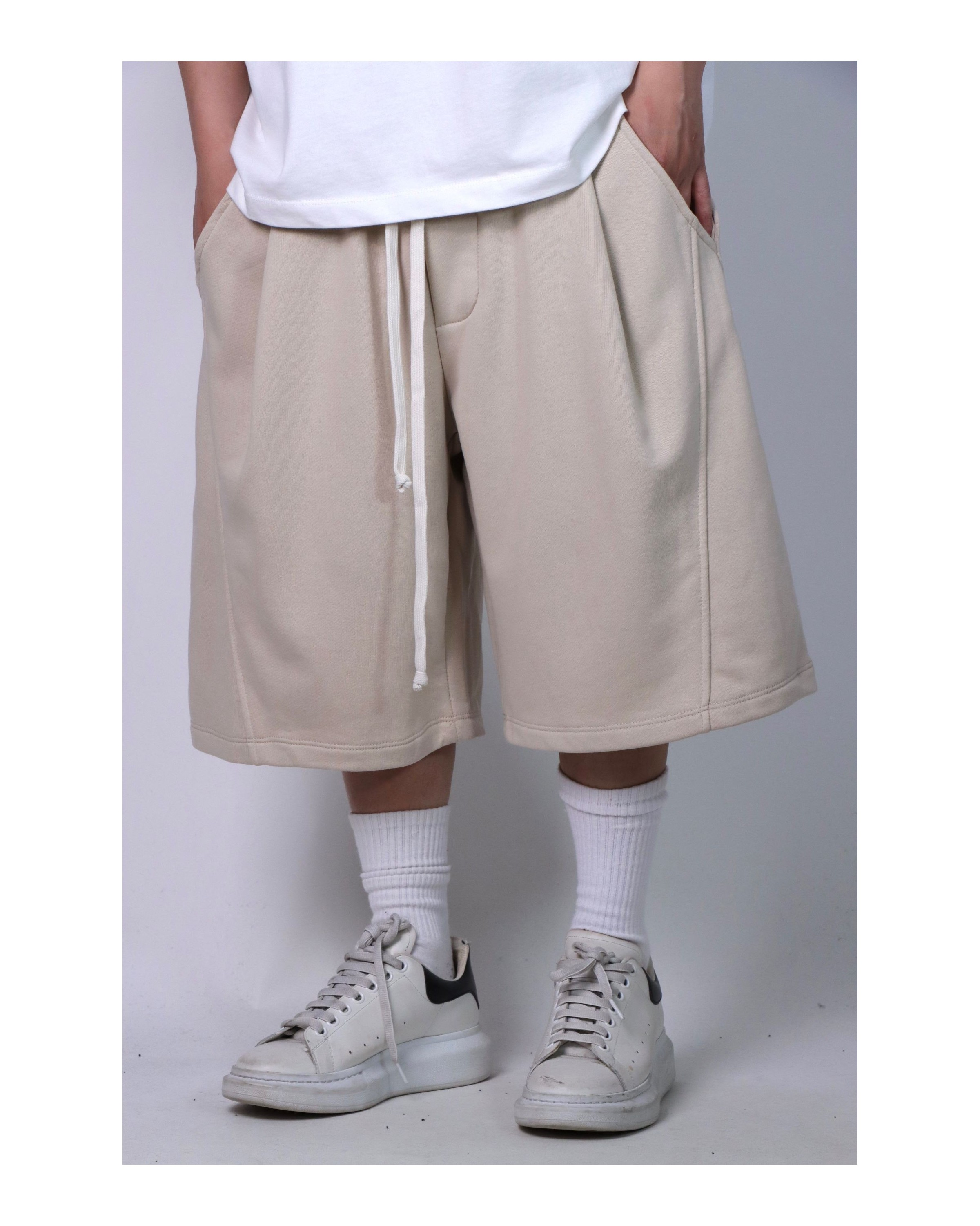 Pantaloncino tuta over beige