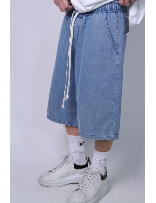 Pantaloncini in jeans slavati